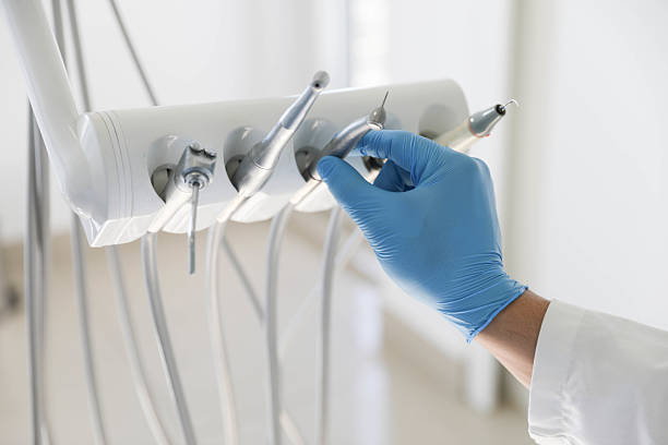 Professional Tooth Extraction technician working in Seven Corners, VA
